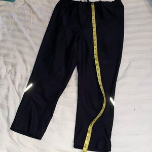 Xersion fitted 3/4 legging workout pant with back pocket reflective